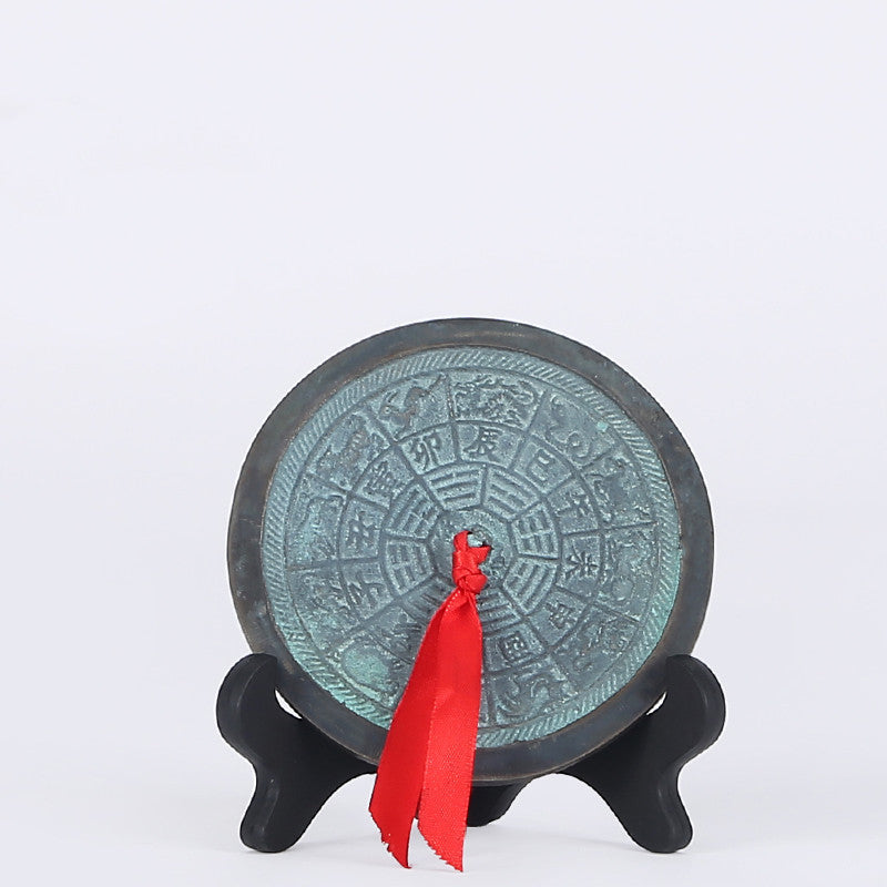 Antique Bagua brass mirror with flat Tai design