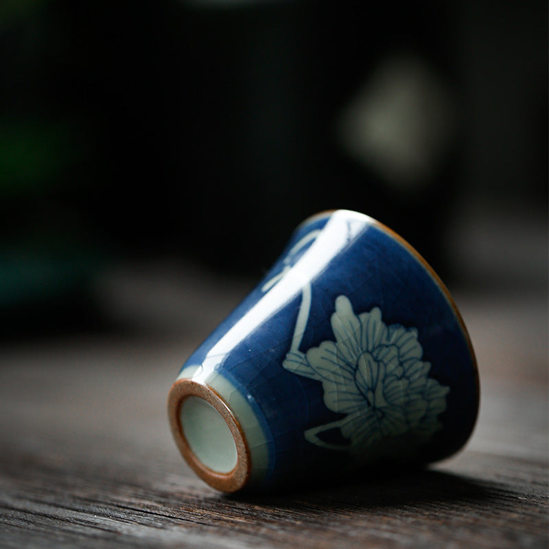 Hand-painted ceramic teapot with blue glaze finish