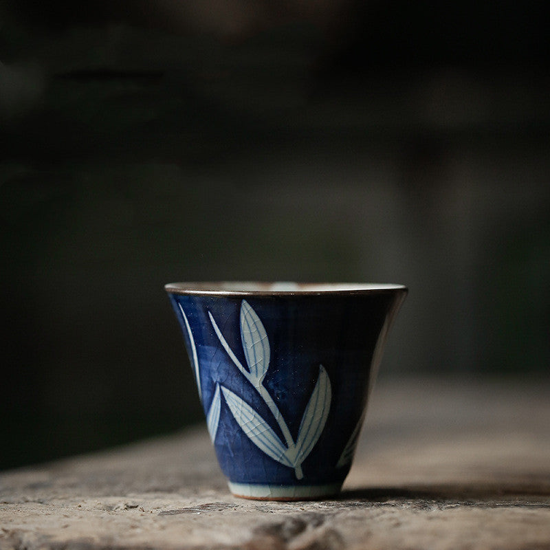 Hand-painted ceramic teapot with blue glaze finish